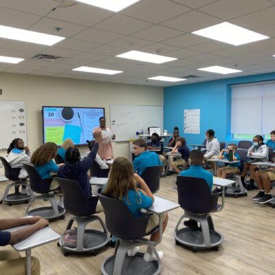 Sixth grade’s Princeton homeroom teacher, Beonca Thompson, leads scholars through their first morning meeting of the new school year.