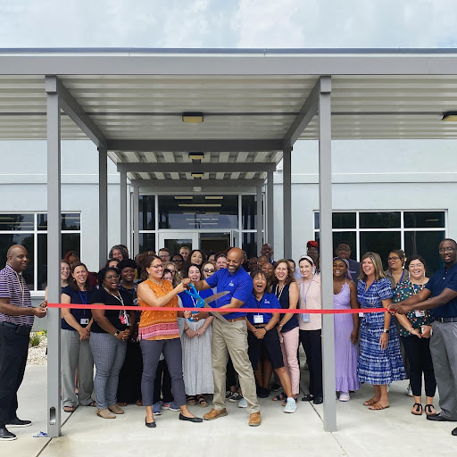 Butler Academy Co-Founders Jerome Reyes and Venesa Reyes officially cut the ribbon at the doors of the school’s new middle school wing in a faculty and staff celebration on July 14. 
